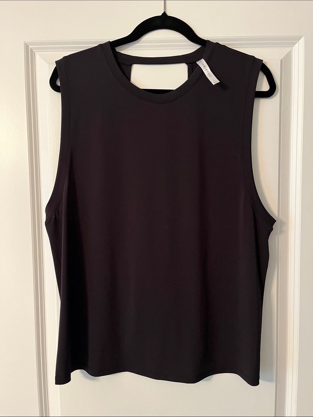 Fabletics Black Crewneck Open Back Twist Knot Muscle Tank (Size Large)